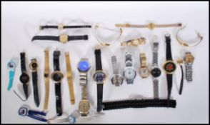 A collection of vintage and retro 20th Century and later wrist watches of various designs to include