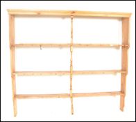 A Victorian 19th century country pine dresser base. The base with a bank of cupboard doors enclosing