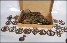 A collection of 20th Century horse brasses to include commemorative, Festival of Britain 1951,