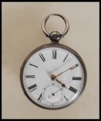 A silver hallmarked open face pocket watch dating from the late 19th century,  having white enamel