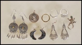 A collection of stamped 925 silver jewellery to include a pair of celtic knot earrings, a pair of
