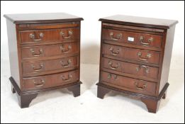 A pair of mid century mahogany bow front Georgian antique style bedside chests of drawers. Each with