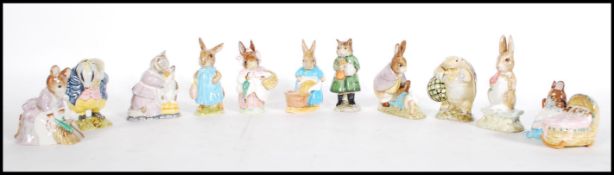 A collection of eleven Beswick Beatrix potter figurines to include Mrs Rabbit, Cecily Parsley, Hunca