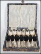 A boxed set of six 19th Century Victorian Wakely & Wheeler silver tea spoons chase decorated