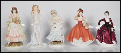 A collection of ceramic figurines to include Coalport Dance Of Dawn, Ladies Of Fashion Flora,