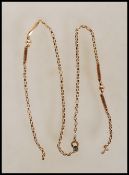 A vintage 9ct gold round link necklace chain with interspersed ball and link decoration with later