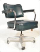 An industrial vintage 20th Century factory work revolving desk chair, over stuffed seat pad and