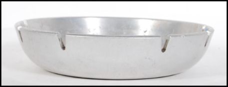 A vintage mid 20th Century large Aluminium ashtray marks to the base reading Kaiser Aluminium
