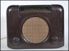A vintage 1940's bakelite Bush radio type DAC. 90. having central round speaker with tuning and