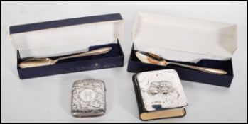 A 19th Century Victorian silver vesta case having engraved scrolled decoration and a circular