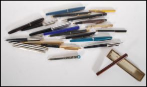 A collection of vintage writing pens and pencils to include a Swan Self Filler pen, a Rufford marble