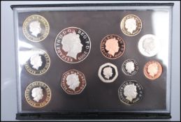 A Royal Mint 2009 UK proof twelve coin set including scarce Kew Gardens 50p, within leather case