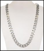 A hallmarked 925 silver heavy curb chain necklace having a lobster claw clasp. Measures 22.5 inches.