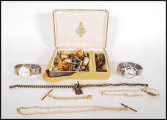 A collection of vintage costume jewellery to include a selection of gold tone cufflinks, a a Sekonda