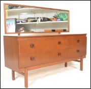 A vintage retro 20th Century teak wood dressing table chest having large rectangular mirror back
