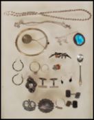 A selection of silver jewellery bearing hallmarks or 925 marks, to include silver hallmarked