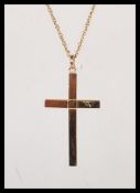 A hallmarked 9ct gold crucifix pendant on a stamped 375 chain. Crucifix hallmarked Sheffield. Weight