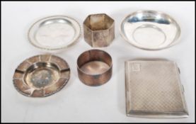 A collection of silver hallmarked items to include a Chester hallmarked cigarette case by
