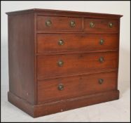 An Edwardian mahogany chest of drawers having two short drawers over three deep drawers with brass