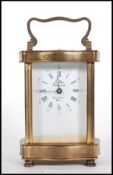 A 20th Century French Gilt Brass Carriage Clock By L`Epee, The enamel dial with Roman & arabic