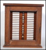 A late 19th Century high Victorian mahogany specimen cabinet, moulded pediment with glazed door to