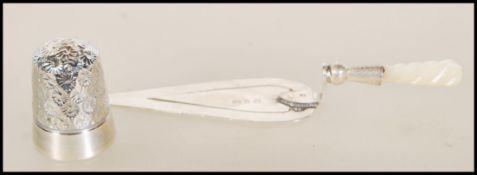 A Victorian silver hallmarked bookmark in the form of a trowel (hallmarked Birmingham 1897) along