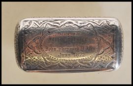 A 19th Century Victorian silver vesta having engraved foliate detailing, the front inscribed '