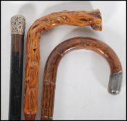 A silver hallmarked malacca walking stick with crook handle and silver knop end. Hallmarks for