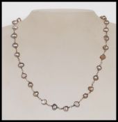 A silver hallmarked ladies grey baroque pearl cluster bracelet having a toggle clasp, along with a
