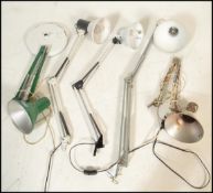 A group of retro 20th century anglepoise  desk lamps one being Danish finished in green, all