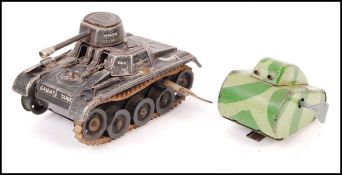 TWO VINTAGE TINPLATE CLOCKWORK WINDUP TANKS