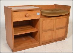 A retro teak wood 20th Century Telephone Seat by Nathan, telephone seat with integral shelves and