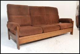A retro 1960's Danish inspired teak wood day bed s