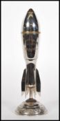 A 1920's / 1930's Art Deco chrome and brass table novelty advertising lighter in the form of a