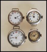 A selection of early 20th Century ladies silver wrist watches to include a square cased watch with
