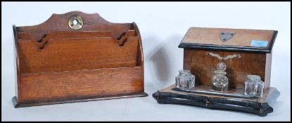 A Victorian mahogany and ebony flash worked desk tidy and inkwell combination having pigeon hole box