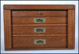 An early 20th Century campaign upcycled oak cutlery canteen, lift up lid Wellington chest front