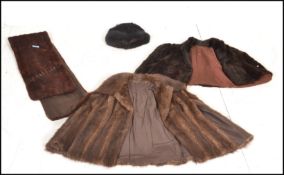 A collection of vintage 20th Century fur clothing to include a fur stole, two capes including one