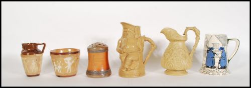 A Royal Doulton series ware pottery tankard decorated in the Night Watchman pattern, D4746,