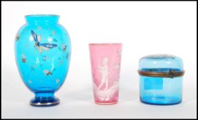 Three pieces of 19th Century Victorian glass to include a small blue glass vase hand decorated