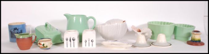 A pair of Bristol Long Line ' Kitchen Ware ' by Poutney & Co Bristol together with a circa 1938