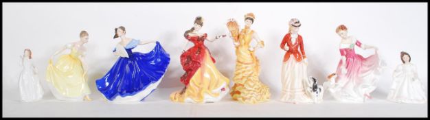 A collection of Royal Doulton ceramic figural ladies to include Elaine HN 2791, Figure of The Year