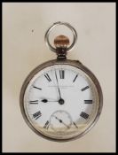 A silver hallmarked pocket watch having open face with crown winder being marked for Haddon &
