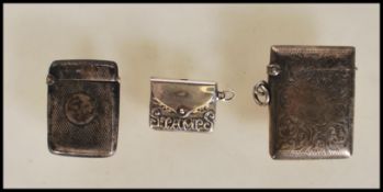 Two silver hallmarked vesta cases dating from the 19th Century, one having engine turned
