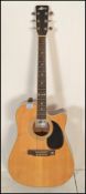 A 20th Century Electro acoustic six string guitar, Model MF / CAE. Mother of pearl inlaid fret