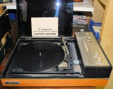A retro 20th Century teak wood cased Pye Black Box record player stereo, teak body with black