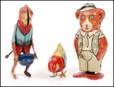 GROUP OF THREE CLOCKWORK WIND UP TOYS