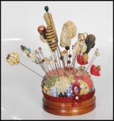 A collection of vintage 20th Century hat pins including simulation pearls, beaded hat pins and