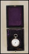 A late 19th Century silver hallmarked open face pocket watch having engraved decoration to the case.