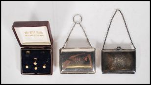 Four 9ct gold studs having engraved floral decoration to on side, in leather stud box. Hallmarked